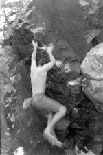 Peter DeSalvo gives in to gravity while climbing at Devil’s Lake State Park. Photo by Marni Foerster.