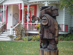 The Mayor Troll holds the key to the city, but clutches a slingshot behind his back. Photo by Danielle Chase.